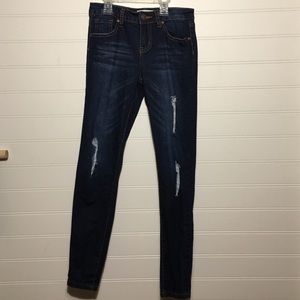 Dark blue ripped jeans